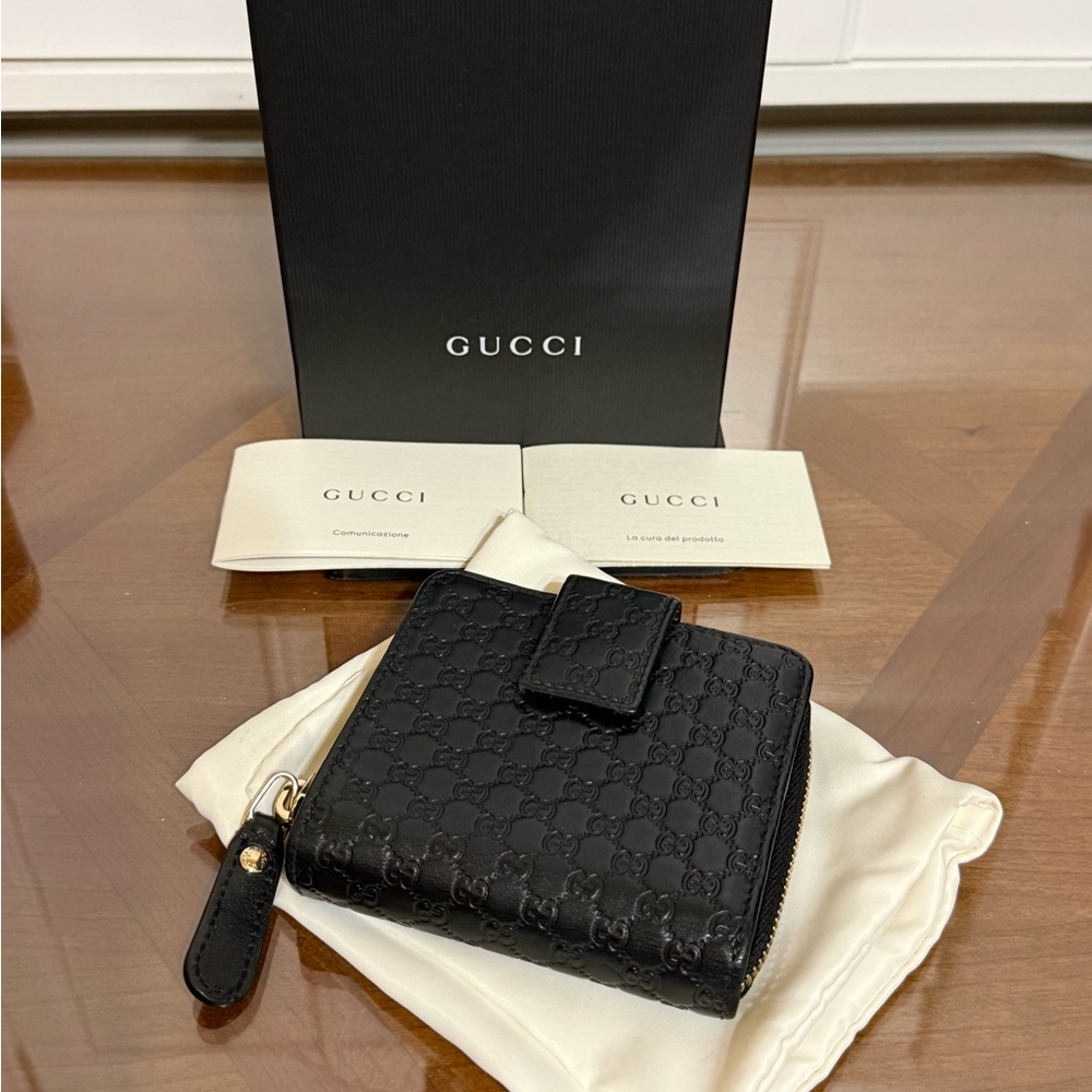 Gucci Black Embossed GG Leather Zip Wallet